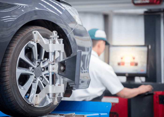 auto mechanic adjustment wheel alignment work